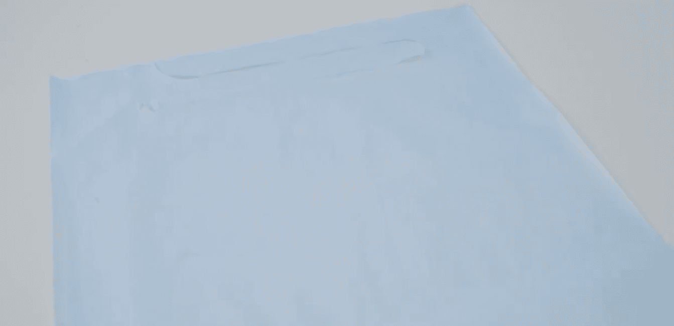 Grembiuli monouso in tessuto impermeabile e polietilene per uso medico con laccio