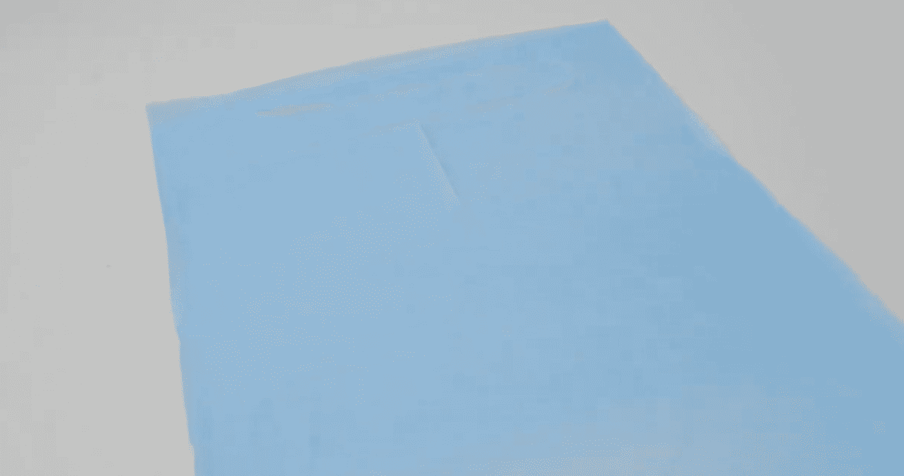 Grembiuli di carta impermeabili monouso con colori personalizzati